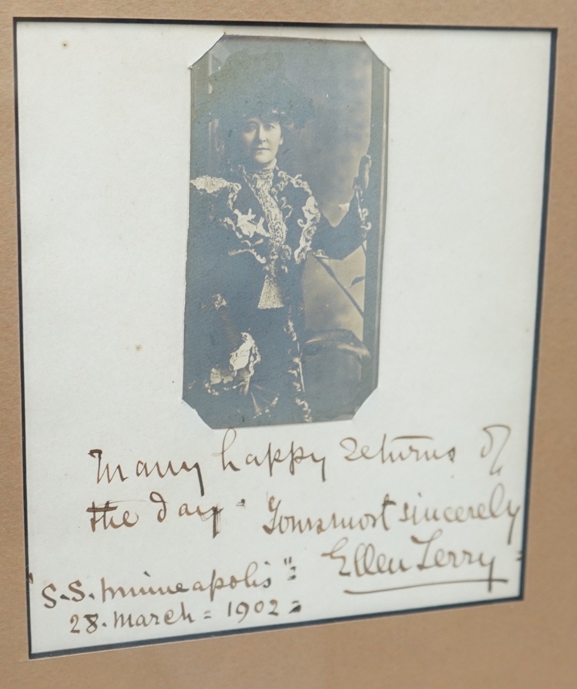 A framed Ellen Terry photograph, with autograph, dated “S.S. Minneapolis” 28. March=1902, 23.5cms wide x 29cms high